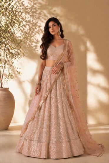 Priyanka Peach Net Thread & Sequins Embroidered Lehenga Saree