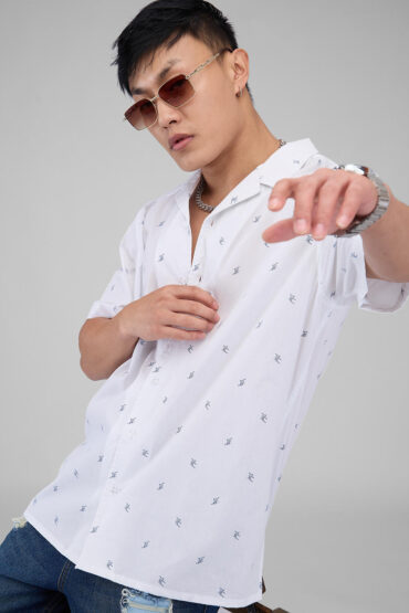 Quirky White Tiny Skiing Printed Oversized Shirt