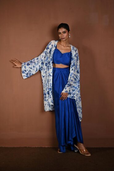 Blue Draped Skirt Set with Matching Blouse and White Cape Jacket