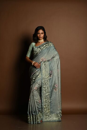 Sage Green Satin Silk Saree with Floral Prints and Parsi Gara Border
